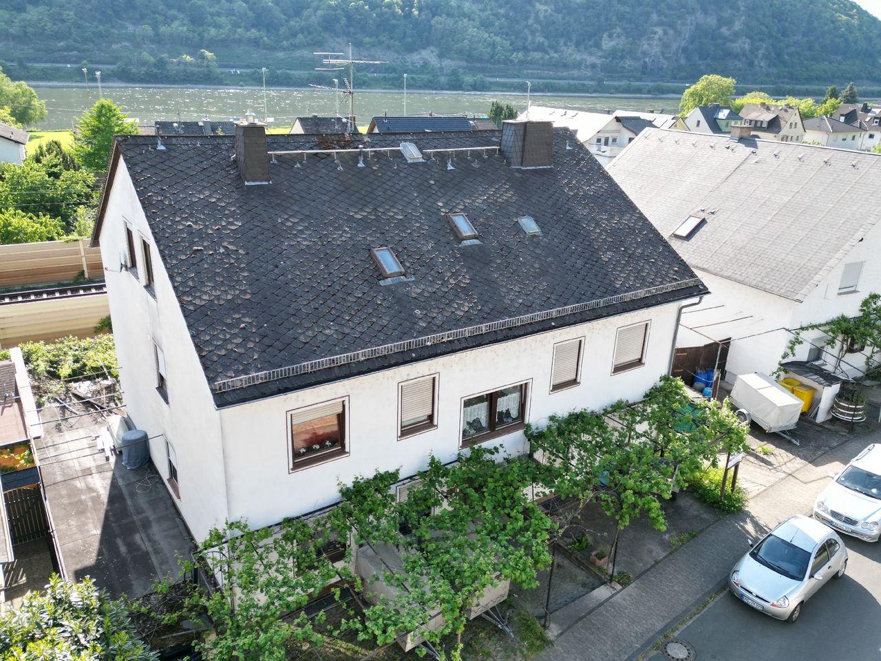 Vermietetes Mehrfamilienhaus mit Potenzial in Kamp Bornhofen!